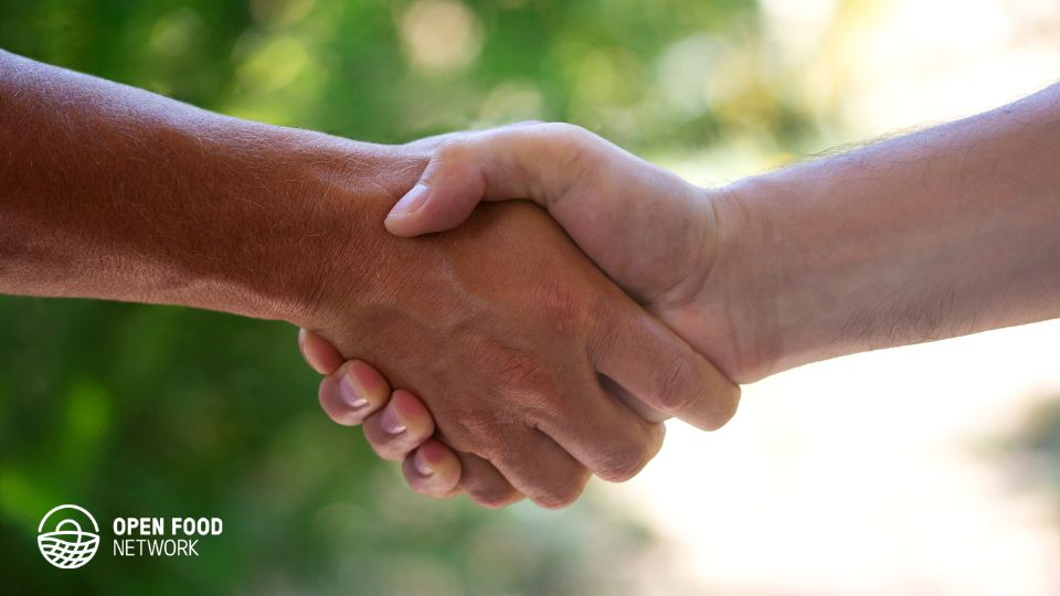 Handshake agreement between two farmers.