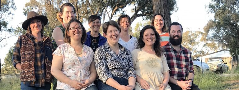 Southern Harvest Staff Members sitting outside